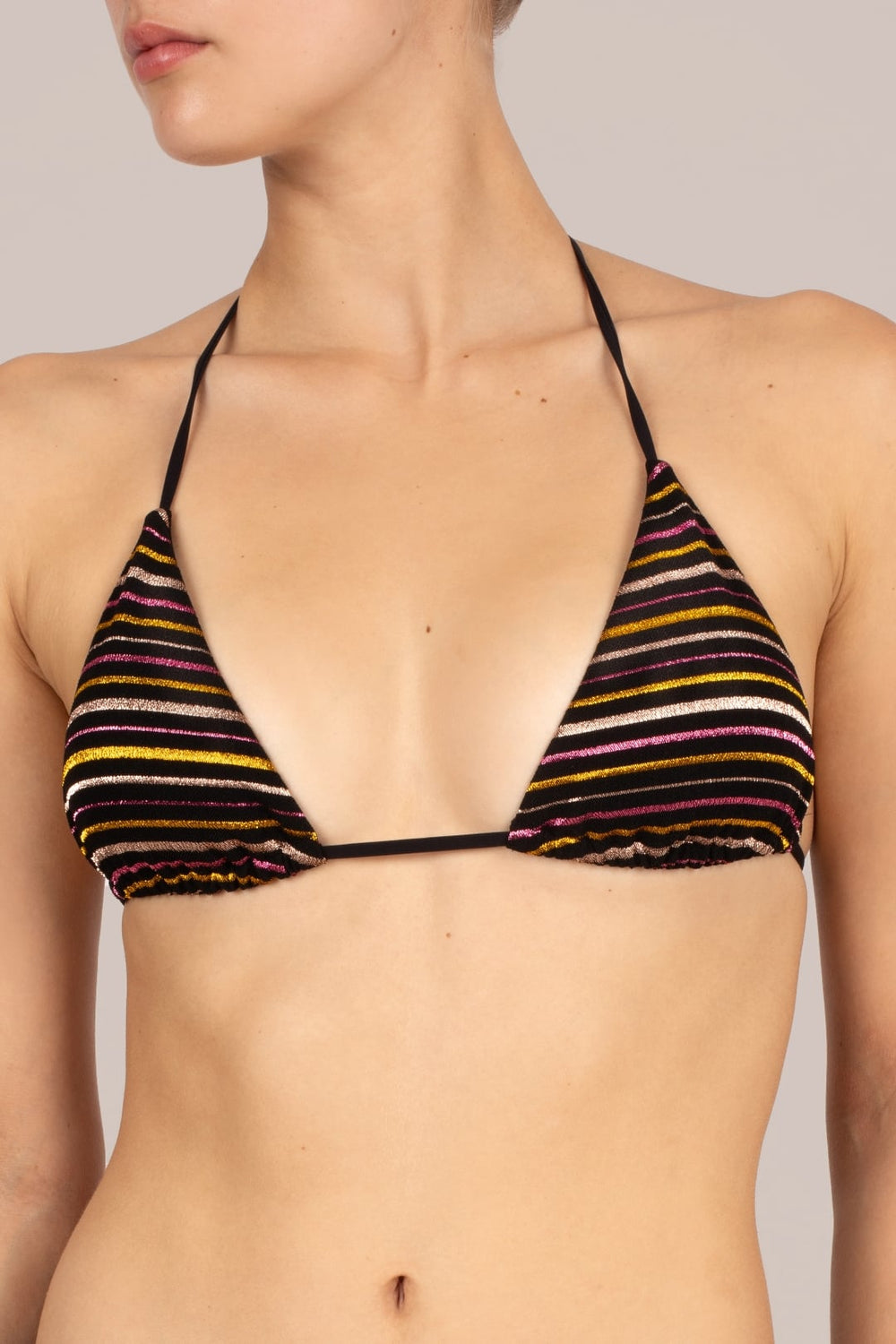 Close-up of bikini top on KIKKI-G Joanna black striped bikini with textured shimmering fabric