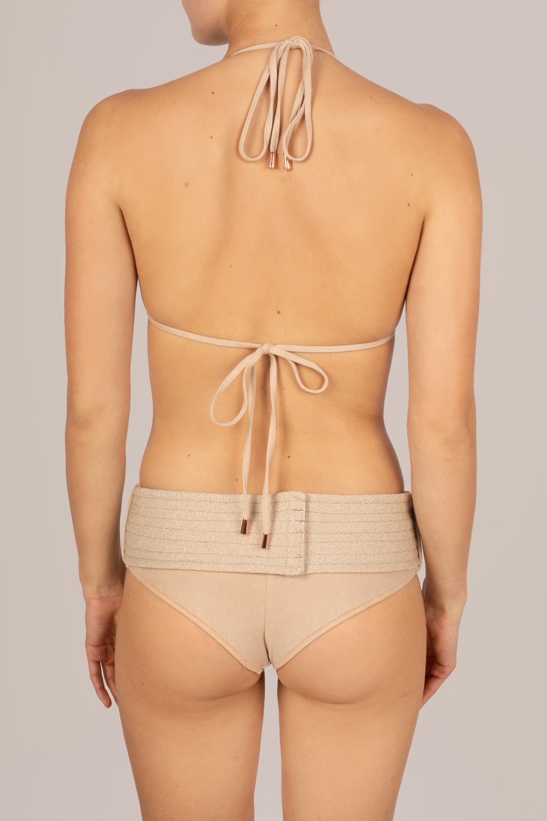 KIKKI-G Ursula beige medium coverage triangle bikini with high-waist briefs on model, back view